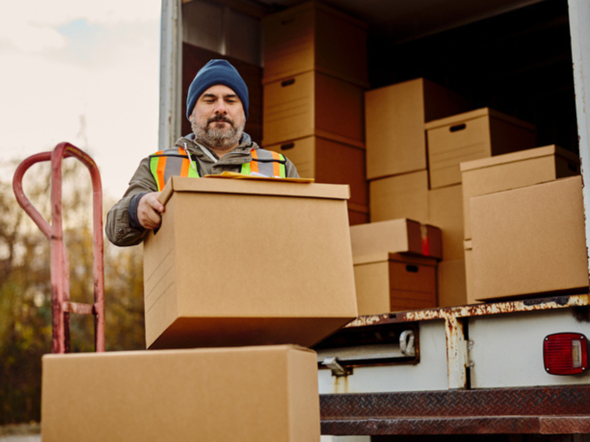 Moving company helping a renter move into a new place