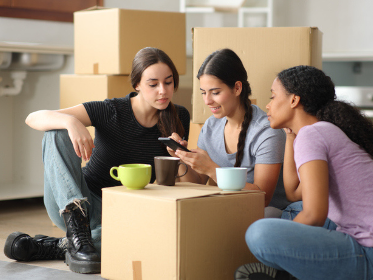 A group of tenants researching tenant insurance coverage