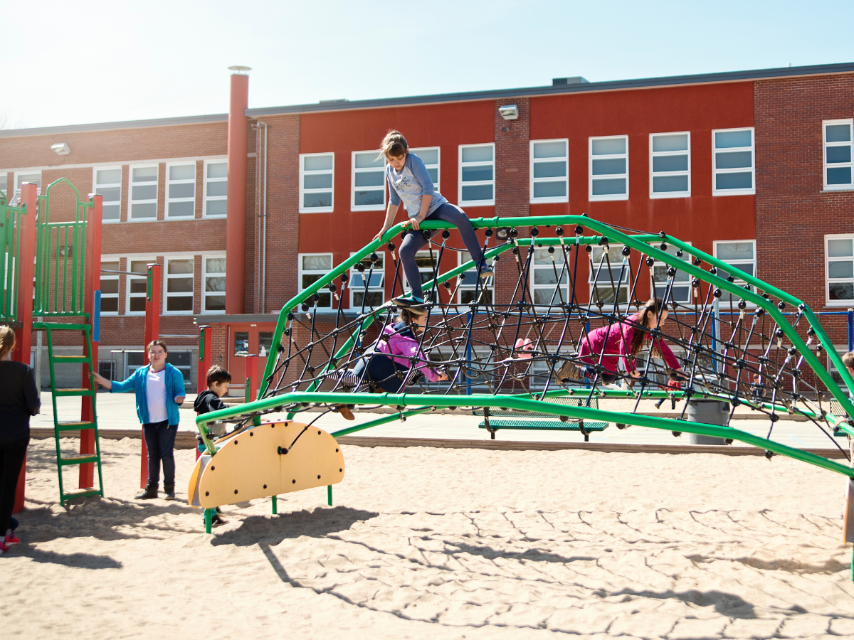 cap kid winners playing on their new playground