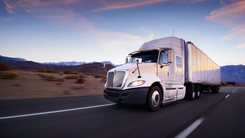 commercial vehicle driving with sandbox commercial auto insurance